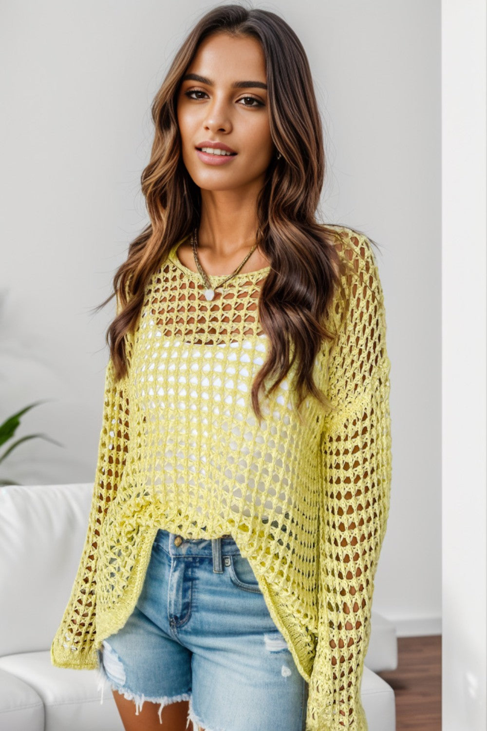 Openwork Round Neck Dropped Shoulder Knit Top Features: Openwork Stretch: Slightly stretchy Material composition: 65% acrylic, 35% polyamide Care instructions: Machine wash cold. Tumble dry low. Imported, ships in 5-10 business days Product measurements:S